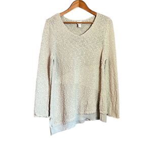 Chico’s metallic asymmetric knit sweater.